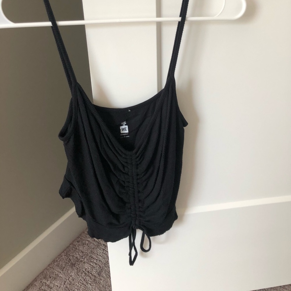 Me to We black tank top